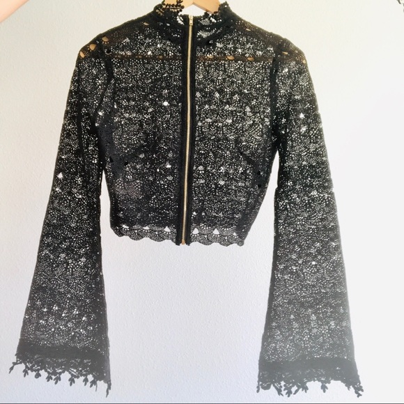 Elegant black  top with pattern and holes - Picture 1 of 4